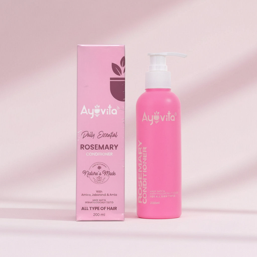 Pink bottle and box of Ayuvita Rosemary Conditioner on a white background